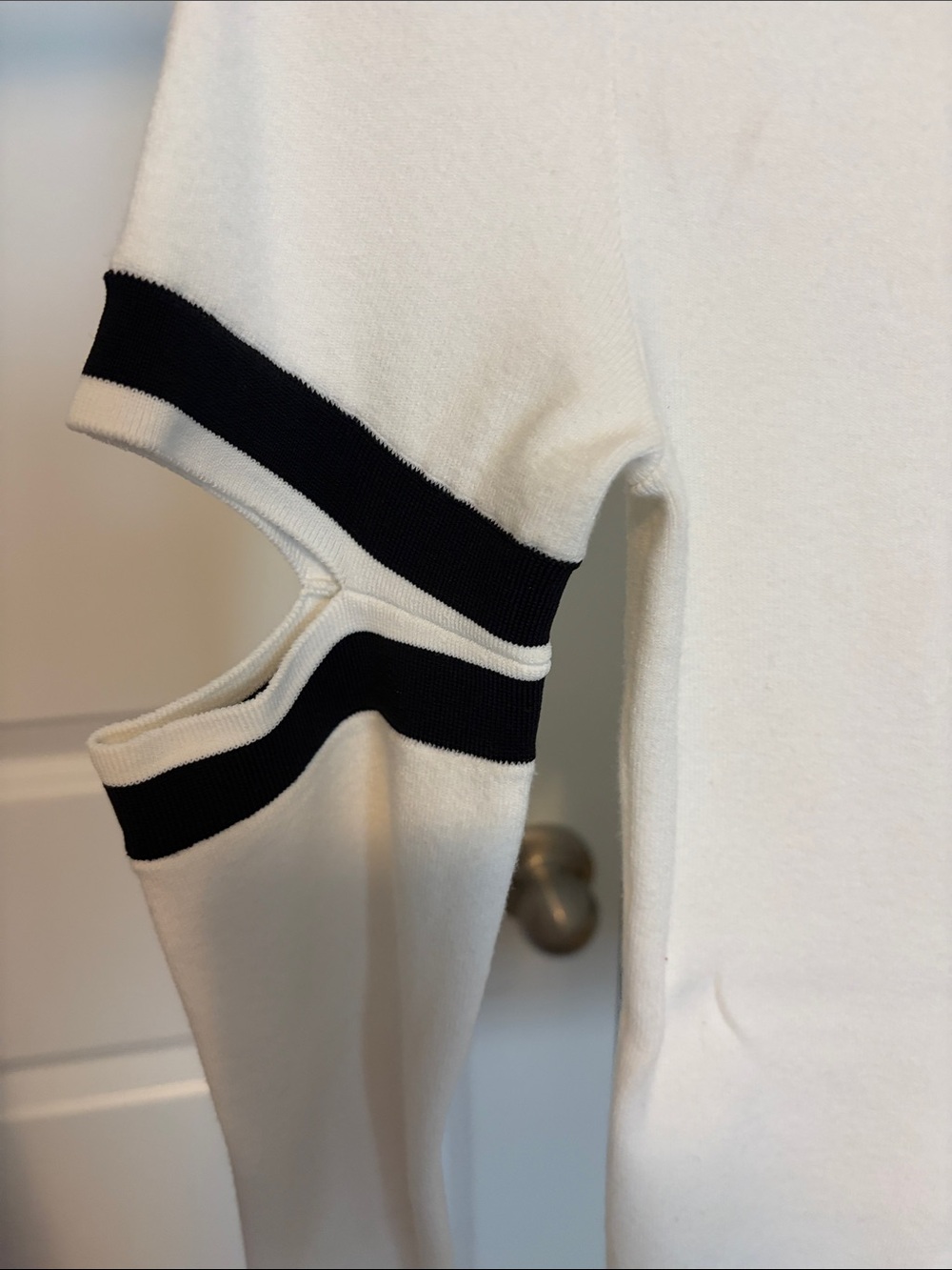 Alice + Olivia White Knit Top with Black Sleeve Stripes and cut outs - Picture 3 of 5